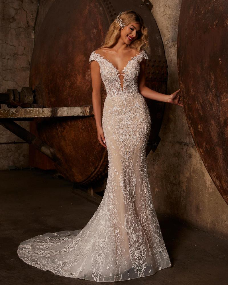 122242 sparkly wedding dress with overskirt and plunging neckline7